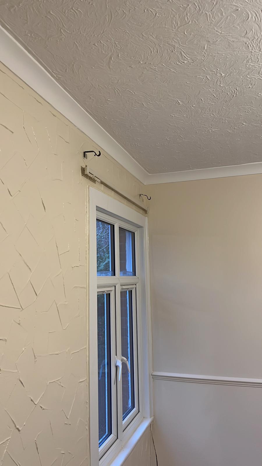 Corner with painted coving, textured wall and dado rail
